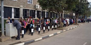 An undated photo of jobseekers in a queuing