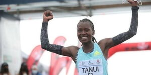 Kenya's Angela Tanui celebrates her victory at Xiamen Marathon on April 11, 2021, 