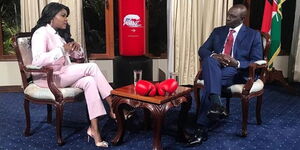 Anne Kiguta (left) with Deputy President William Ruto at the DP's Karen, Nairobi home in July 2019