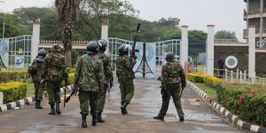 Anti-riot police deployed at the Multi Media University on Friday, November 20.