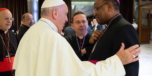 Archbishop Anthony Muheria (left) meets Pope Francis during a tour to the Vatican in October 2018.