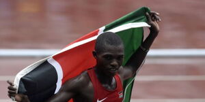 Athlete Gilbert Kwemoi celebrates after winning Gold medal in China in 2014.