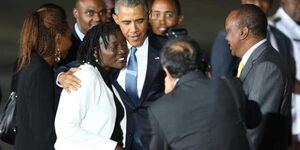 Auma Obama pictured at the Jomo Kenyatta International Airport (JKIA) with his half-brother former US President Barack Obama in Nairobi on July 24, 2015