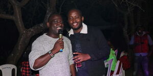 BBC journalist Roncliffe Odit and a colleague during the scribes end of year party on Saturday, December 13, 2021.