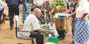 Ambilikile Mwasapile alias Babu wa Loliondo, a self-declared miracle healer in Tanzania, who shot to fame between 2010 and 2012 for his alleged miracle cure dispenses his single-cup remedy he claimed could cure a myriad of diseases. 