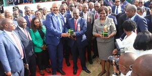 Deputy President Rigathi Gachagua presenting an award to NMS Director General Mohamed Badi on Wednesday September 28, 2022.