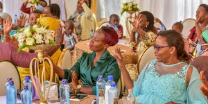 Athi Water Works Development Agency board member Betty Maina (left) and former Nairobi County Speaker Beatrice Elachi at a function on November 15 in Murang'a