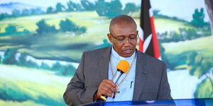 Bishop David Kariuki Ngare alias Gakuyo during a church service