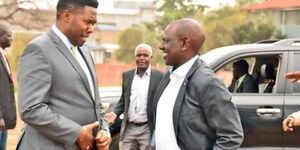 Bishop Kiogora Magambo (left) and DP William Ruto.