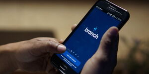 An image of a user opening the Branch Digital Application.