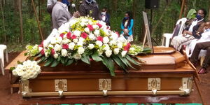 The casket bearing the remains of Brian Kimani during his burial on Monday, June 22