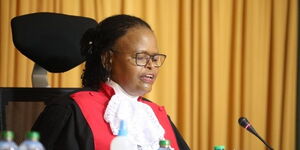 Chief Justice Martha  Koome reading her ruling on the BBI Appeal at the Supreme Court on March 31, 2022.