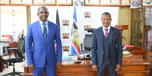 CS Ukur Yattani (left) and Embakasi East MP Babu Owino at Treasury office on Thursday, March 11, 2021.