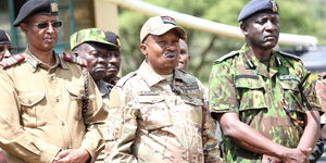 Interior Cabinet Secreatry Kithure Kindiki flanked by other security personnel in Lamu on December 7, 2023.
