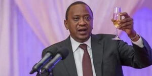 An undated file image of President Uhuru Kenyatta toasting