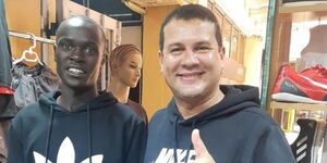 Dennis Cheruiyot (left) with Neto Goncalves, a Brazilian coach in Kenya