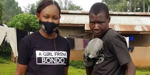 Caroll Radull (left) pictured with iconic boxer Conjestina Achieng' in Siaya County