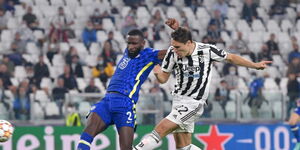 Chelsea's Anthony Rudiger (left) scrambles for the ball past Juventus Federico Chiesa 