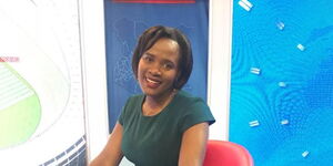KTN News anchor Mary Kilobi poses for a photo at the station's studios.