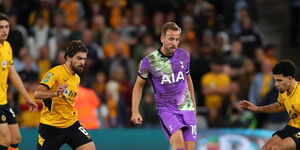 Tottenham's Harry Kane battles the ball against Wolves players during a past Premier League match. 