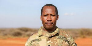 Joshua Omwenga, a combat medic in the 444th Minimal Care Detachment unit of the US Army., poses for a photo.