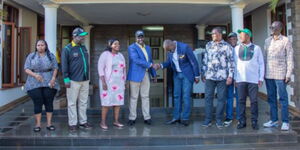 Deputy President William Ruto (centre) shakes hands with Nairobi Senator Johnson Sakaja during a meeting in Karen on Saturday, April 9, 2022. 