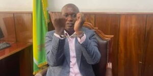 Nairobi County Assembly speaker Benson Mutura pictured in handcuffs on Wednesday, April 20.