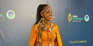 Kenyan nurse Anna Qabale Duba poses with the Aster Guardians Global Nursing Award held on Thursday, May 12 at Atlantis Hotel in the United Arab Emirates. 