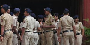 An image of police officers attached to Azad Maidan station on patrol. 