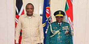 President Uhuru Kenyatta (left) and NYS service commander, Matilda Sakwa.