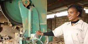 An image of Joy Waithera working at her business, Meraki by J.