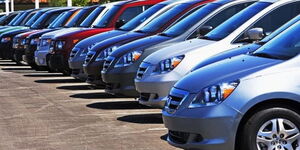 A photo of cars in a showroom.