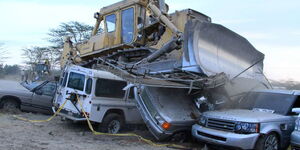 File photo of different imported vehicles being destroyed 