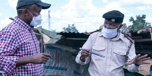 Centum Group CEO James Mworia (Left) and Benjamin Maina, a Government Administrator, pictured in Githogoro, Kiambu County April. The Centum Foundation has embarked on a development project in the area.