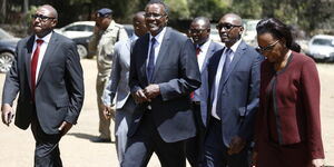 Chief Justice David Maraga (second left) with Environment and Lands Court judge Justice Sila Munyao (centre) and Chief Registrar of the Judiciary Anne Amadi (right) at Nakuru Children's court in September 2019