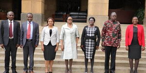 Chief-Justice-Martha-Koome-Poses-for-a-Photo-With-the-Newly-Appointed-Commissioners-at-The-Supreme-C.