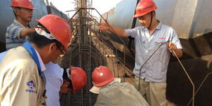 Chinese Citizens at work during the construction of the SGR