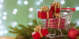A shopping cart with Christmas Gifts