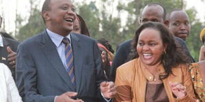 President Uhuru Kenyatta and Kirinyaga Governor Anne Waiguru during her homecoming ceremony at Kiamugumo Secondary School in 2014