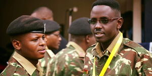 Corporal Sammy Ondimu Ngare (right) pictured alongside his colleague.