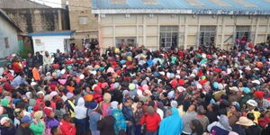 A crowd waits for the issuance of bursaries in Githurai 45 on April 3, 2023.