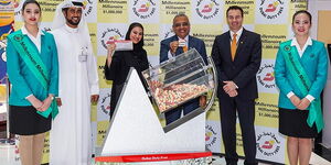 Officials at the latest Dubai Duty Free Millennium Millionaire and Finest Surprise draw.