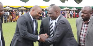 Ex-Sports CS Rashid Echesa welcomes DP William Ruto at the funeral service for Ikolomani MP Bernard Shinali's son on August 8, 2019.