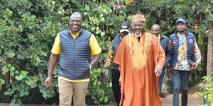 President William  Ruto and the Kiama Kia Ma patron Kung'u Muigai at Karen on July 1, 2022