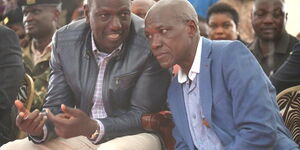 Deputy President William Ruto and former Kakamega Senator Boni Khalwale during the requiem mass for Adelaide Khalwale at Malinya village in Ikolomani, Kakamega County on October 10, 2019.