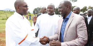 Deputy President William Ruto shakes hands with a cleric after arriving at the Catholic Church of Uganda Martyrs Kibirichia Parish, Meru County on Sunday, March 8
