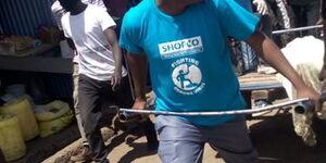 A Mathare residents drives a hand-cart with the body of Vitalis Owino to Muthaiga Police Station on May 4, 2020