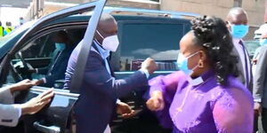 Deputy President William Ruto (Left) and Bishop Margaret Wanjiru outside Jesus Is Alive Ministries Church in Nairobi on December 6, 2020.