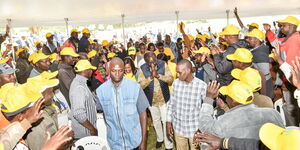 Deputy President William Ruto (in a navy-blue half coat) during the Njoro event on Monday, June 20, 2022.