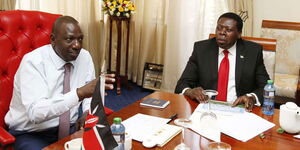 President William Ruto (right) in a meeting with former Devolution CS Eugene Wamalwa
